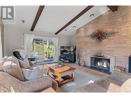 3131 Elliott Road, West Kelowna, BC - Indoor Photo Showing Living Room With Fireplace