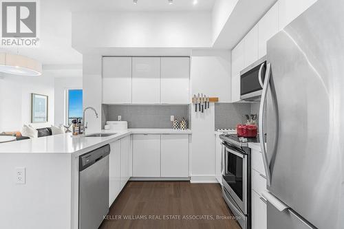 1007 - 20 Shore Breeze Drive, Toronto (Mimico), ON - Indoor Photo Showing Kitchen With Upgraded Kitchen