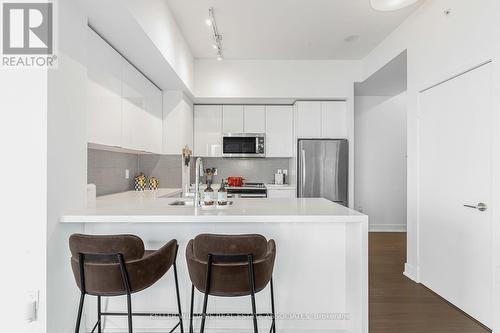 1007 - 20 Shore Breeze Drive, Toronto (Mimico), ON - Indoor Photo Showing Kitchen With Double Sink With Upgraded Kitchen