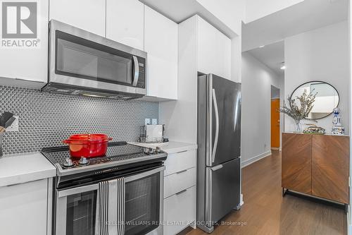 1007 - 20 Shore Breeze Drive, Toronto (Mimico), ON - Indoor Photo Showing Kitchen With Upgraded Kitchen