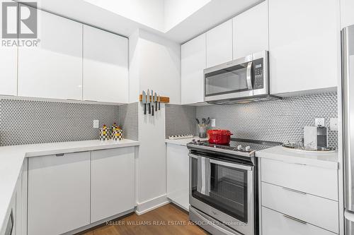 1007 - 20 Shore Breeze Drive, Toronto (Mimico), ON - Indoor Photo Showing Kitchen With Upgraded Kitchen