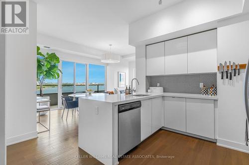 1007 - 20 Shore Breeze Drive, Toronto (Mimico), ON - Indoor Photo Showing Kitchen With Upgraded Kitchen