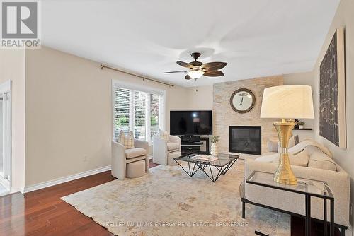 36 Evenwood Avenue, Toronto (Centennial Scarborough), ON - Indoor Photo Showing Living Room With Fireplace