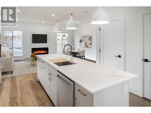 819 Stockwell Avenue Unit# 1, Kelowna, BC - Indoor Photo Showing Kitchen With Fireplace