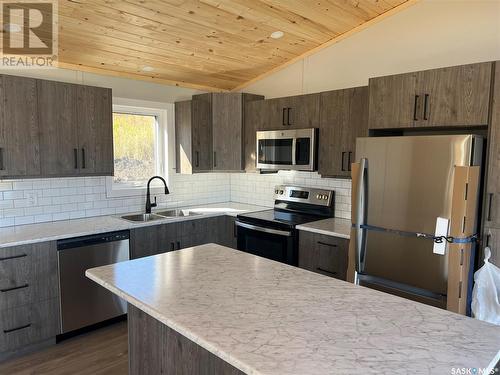 913 Pincherry Place E, Katepwa Beach, SK - Indoor Photo Showing Kitchen With Double Sink With Upgraded Kitchen