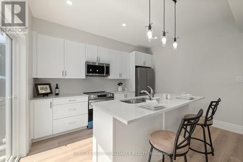 26 Campbell Crescent, Prince Edward County (Picton), ON - Indoor Photo Showing Kitchen With Double Sink With Upgraded Kitchen