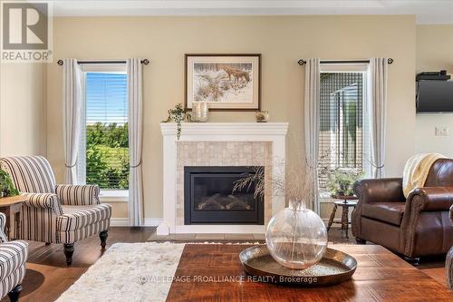 36 Dorchester Drive, Prince Edward County (Wellington), ON - Indoor Photo Showing Living Room With Fireplace