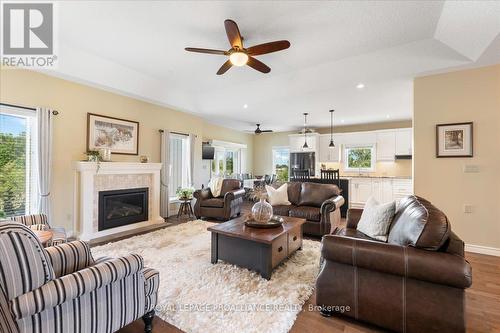 36 Dorchester Drive, Prince Edward County (Wellington), ON - Indoor Photo Showing Living Room With Fireplace