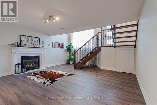 5 Selkirk Crescent, Barrie (Holly), ON - Indoor Photo Showing Living Room With Fireplace