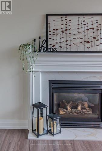 5 Selkirk Crescent, Barrie (Holly), ON - Indoor Photo Showing Living Room With Fireplace