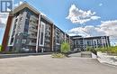 334 - 128 Grovewood Common, Oakville, ON  - Outdoor With Balcony With Facade 