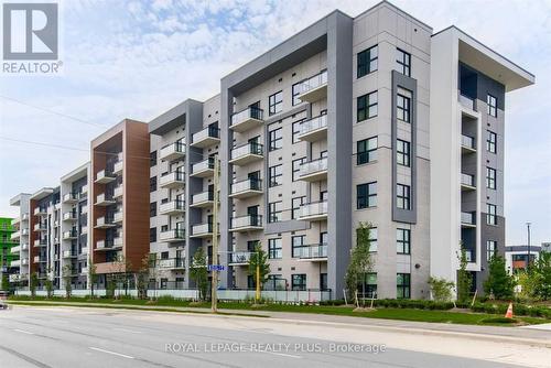 334 - 128 Grovewood Common, Oakville, ON - Outdoor With Balcony With Facade