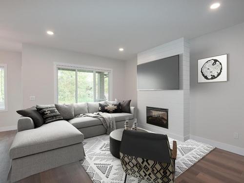 129-200 Grand Boulevard, Kamloops, BC - Indoor Photo Showing Living Room With Fireplace