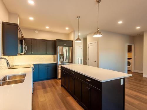 129-200 Grand Boulevard, Kamloops, BC - Indoor Photo Showing Kitchen With Double Sink