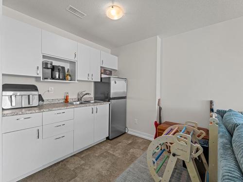 131-8800 Dallas Drive, Kamloops, BC - Indoor Photo Showing Kitchen With Double Sink