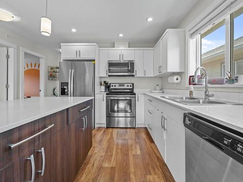 131-8800 Dallas Drive, Kamloops, BC - Indoor Photo Showing Kitchen With Stainless Steel Kitchen With Double Sink With Upgraded Kitchen