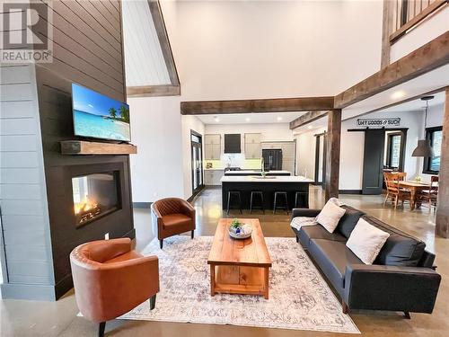 Unparalleled Space For Entertaining - 55 Hanlon Bay Road, Elgin, ON - Indoor Photo Showing Living Room With Fireplace