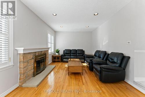 32 Addington Square, Markham, ON - Indoor Photo Showing Living Room With Fireplace