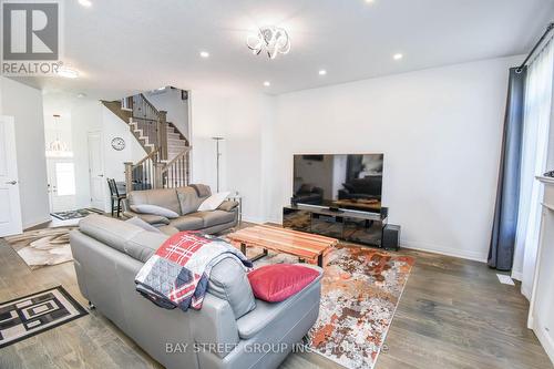 9 Copperhill Heights, Barrie (Painswick South), ON - Indoor Photo Showing Living Room With Fireplace