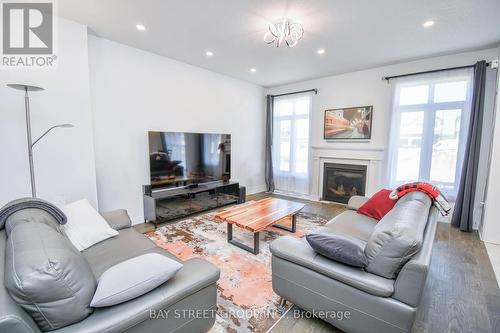 9 Copperhill Heights, Barrie (Painswick South), ON - Indoor Photo Showing Living Room With Fireplace