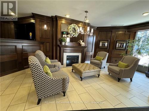 404 - 1237 North Shore Boulevard, Burlington (Brant), ON - Indoor With Fireplace