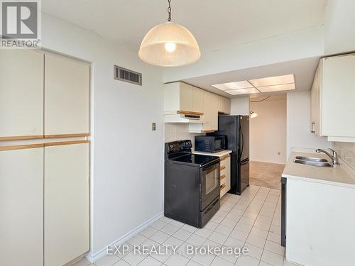 1210 - 10 Malta Avenue, Brampton (Fletcher'S Creek South), ON - Indoor Photo Showing Kitchen With Double Sink