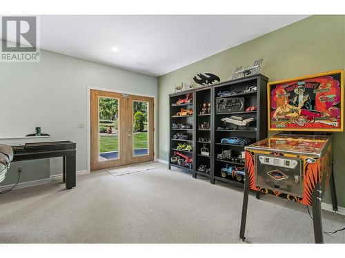 Family Room has double doors out to covered patio with hot tub. - 2726 Golf Course Drive, Blind Bay, BC - Indoor