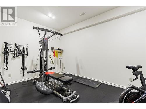 Exercise Room on lower level. - 2726 Golf Course Drive, Blind Bay, BC - Indoor Photo Showing Gym Room