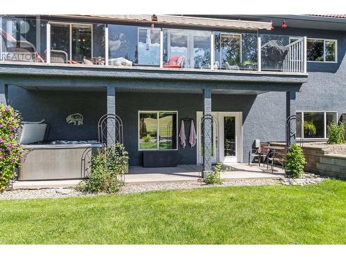 Raised Deck over Patio with Hot Tub - 2726 Golf Course Drive, Blind Bay, BC - Outdoor With Deck Patio Veranda