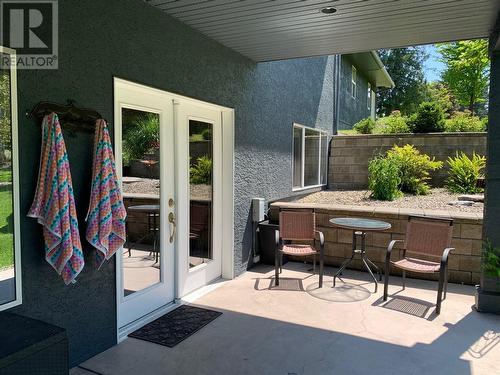 Patio view from hot tub. - 2726 Golf Course Drive, Blind Bay, BC - Outdoor With Deck Patio Veranda With Exterior