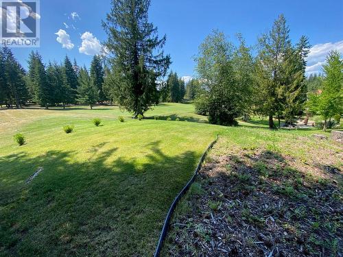 Little bushes also help indicate rear property border with golf course. - 2726 Golf Course Drive, Blind Bay, BC - Outdoor