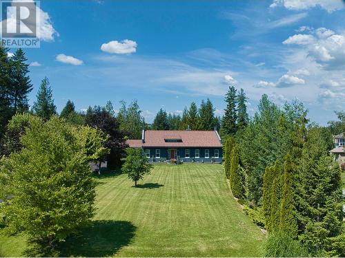 Set well back from the street for privacy - 2726 Golf Course Drive, Blind Bay, BC - Outdoor With View