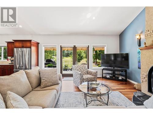 Living Room has doors out to raised deck. - 2726 Golf Course Drive, Blind Bay, BC - Indoor Photo Showing Living Room