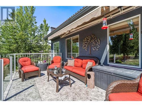 Raised deck has retractable awnings with drop down sides. - 2726 Golf Course Drive, Blind Bay, BC - Outdoor With Deck Patio Veranda With Exterior