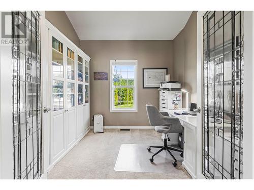 Office/Library with French doors open off Living Room - 2726 Golf Course Drive, Blind Bay, BC - Indoor Photo Showing Office