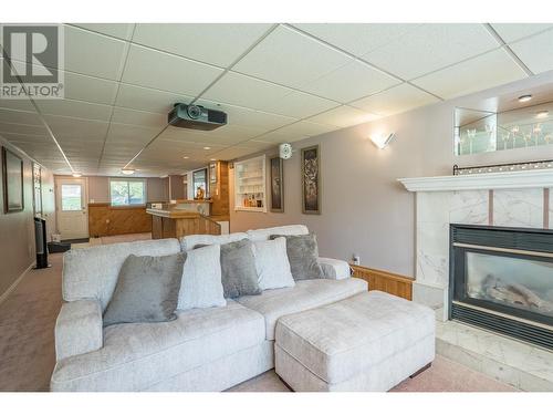 9094 North Nechako Road, Prince George, BC - Indoor Photo Showing Living Room With Fireplace