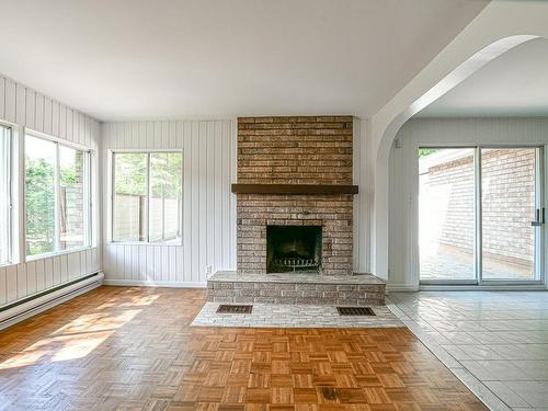 Living room - 5680 Ch. Des Hauteurs, Sainte-Adèle, QC - Indoor Photo Showing Living Room With Fireplace