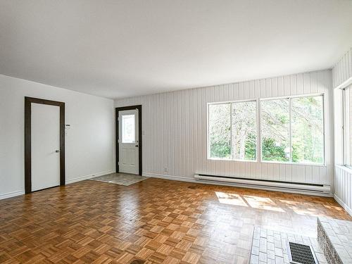 Living room - 5680 Ch. Des Hauteurs, Sainte-Adèle, QC - Indoor Photo Showing Other Room