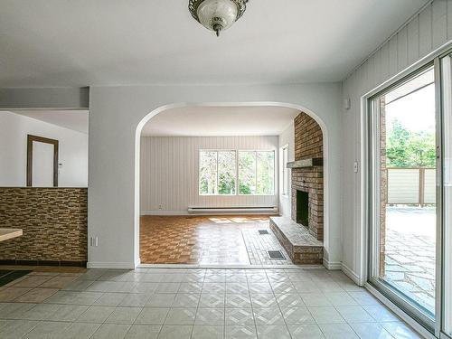 Dining room - 5680 Ch. Des Hauteurs, Sainte-Adèle, QC - Indoor Photo Showing Other Room With Fireplace