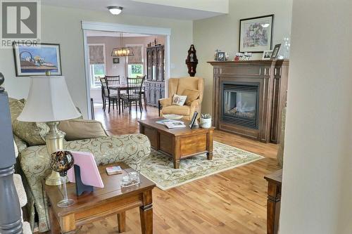 17 Acharya Drive, Paradise, NL - Indoor Photo Showing Living Room With Fireplace