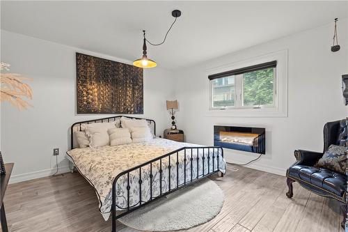 19 Minstrel Court, Hamilton, ON - Indoor Photo Showing Bedroom With Fireplace