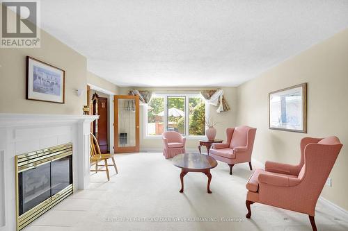 74 - 2 Cadeau Terrace, London, ON - Indoor Photo Showing Living Room With Fireplace