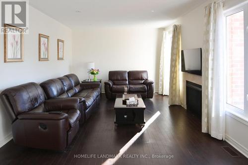 18 Wandering Glider Trail, Bradford West Gwillimbury (Bradford), ON - Indoor Photo Showing Living Room With Fireplace