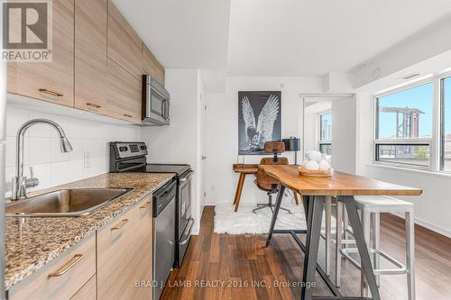 801 - 20 Joe Shuster Way, Toronto (Waterfront Communities), ON - Indoor Photo Showing Kitchen With Stainless Steel Kitchen