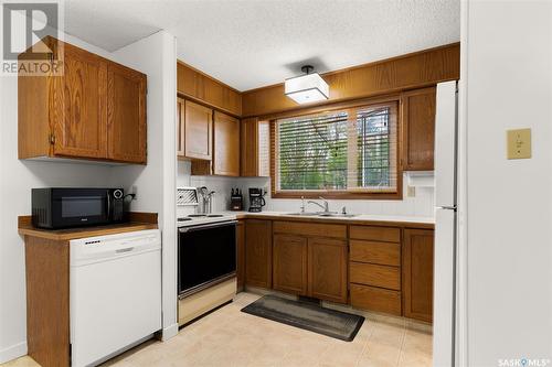 108 Oakview Drive, Regina, SK - Indoor Photo Showing Kitchen With Double Sink