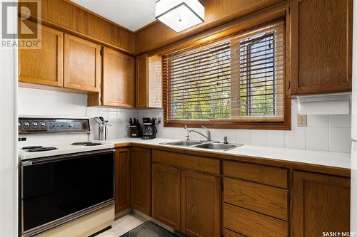 108 Oakview Drive, Regina, SK - Indoor Photo Showing Kitchen With Double Sink