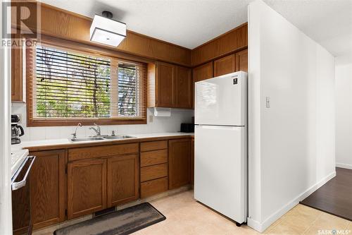 108 Oakview Drive, Regina, SK - Indoor Photo Showing Kitchen With Double Sink