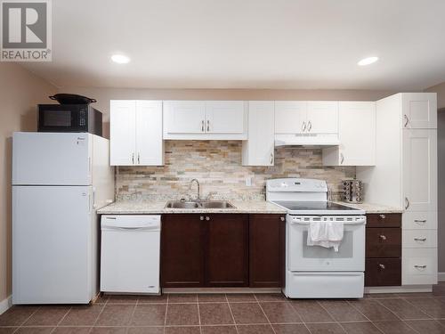 2505 Kenney Court, Prince George, BC - Indoor Photo Showing Kitchen With Double Sink