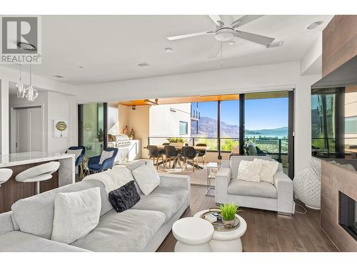 3000 Ariva Drive Unit# 3205, Kelowna, BC - Indoor Photo Showing Living Room With Fireplace