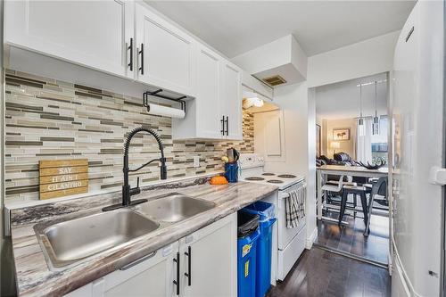 350 Quigley Road|Unit #749, Hamilton, ON - Indoor Photo Showing Kitchen With Double Sink